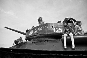 kids playing on a tank, Tiraspol, Moldova, description on the tank- for the victory