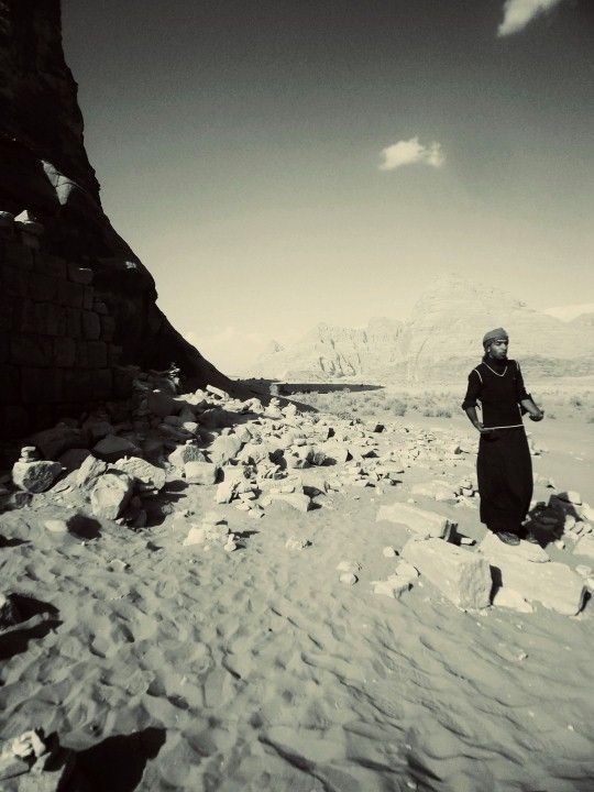 image10-The area is becoming a valuable touristic attraction, and most of the bedouins are making a living out of it. They work as tour guides, have their own tents for tourists, etc. On the photo: Tourist guide at Lawrence's house.