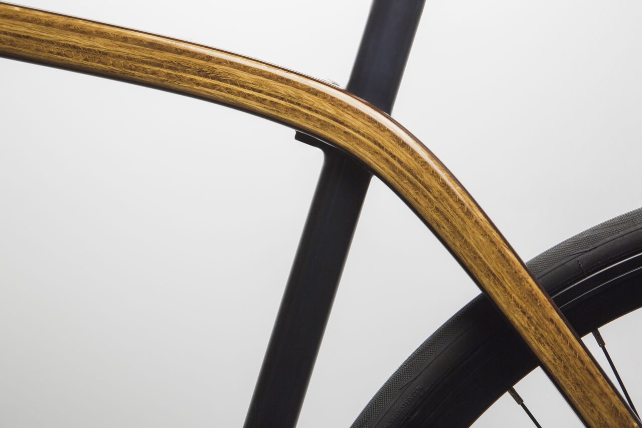 A sideview detail of the new Tratar Bikes wooden bicycle pictured in the studio