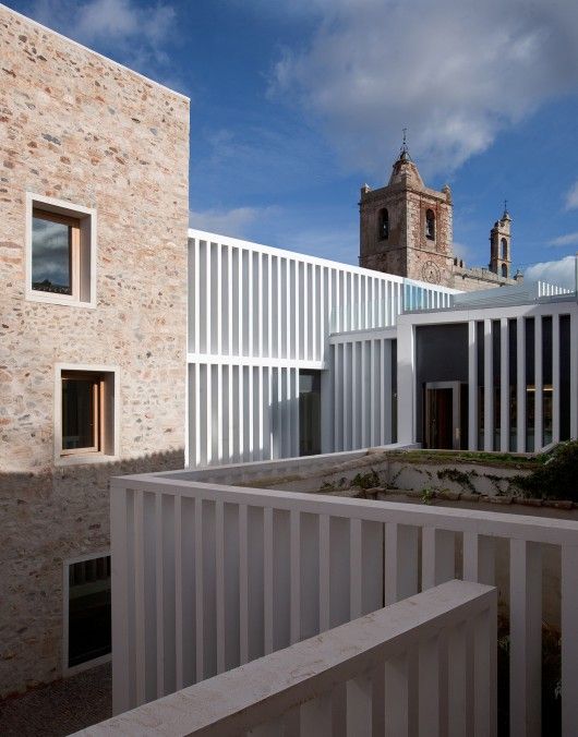 54d4d4fae58ece20b60000bf_40-projects-shortlisted-for-the-2015-eu-prize-for-contemporary-architecture-mies-van-der-rohe-award_atrio__relais_ch-teaux-_im-530x676