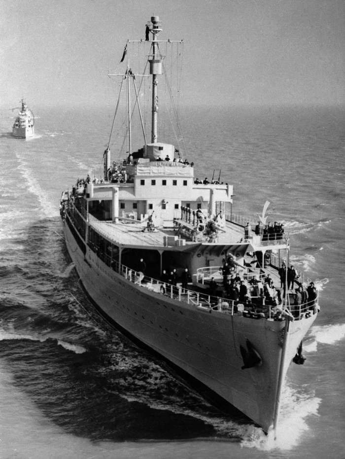 Image: U1022358, Original caption: President Tito (arrow) of Yugoslavia stands on the upper deck of the Yugoslav training ship Galeb as it arrives with a British Destroyer escorting the vessel off the Thames Estuary, Mar.15. British authorities have thrown a security "curtain" around the docks and waterfront where the Yugoslav leader will debark. Precautions, which have been taken to protect Tito from any would-be Red Assassins, which have been the heaviest since World War II., Place: London, England, UK, License: Rights managed, Credit line: profimedia.cz, Corbis